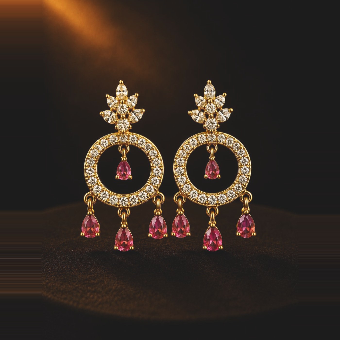 Ruby-toned halo hoop earrings with pear drops