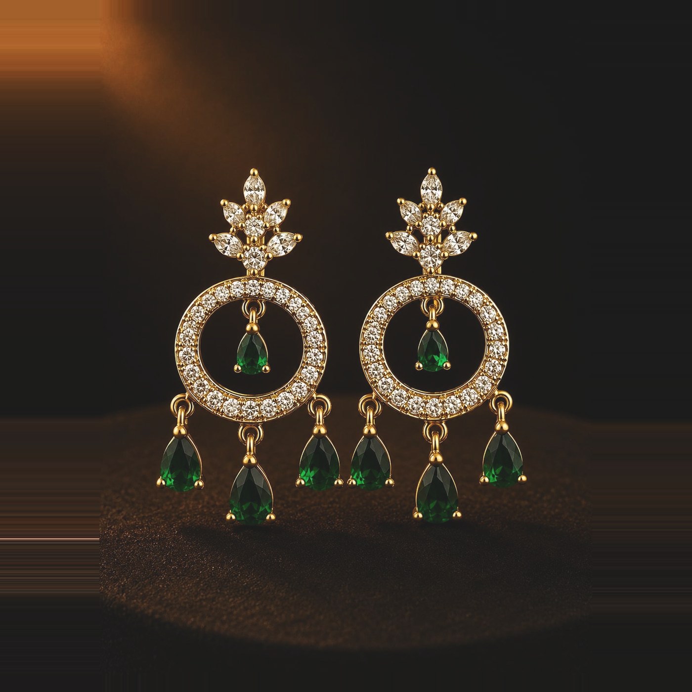 Emerald-toned halo hoop earrings with pear drops