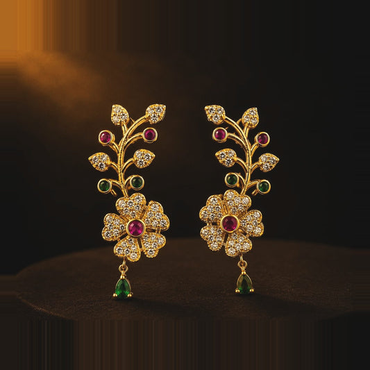 Clear stone vine earrings with emerald-toned pear drop