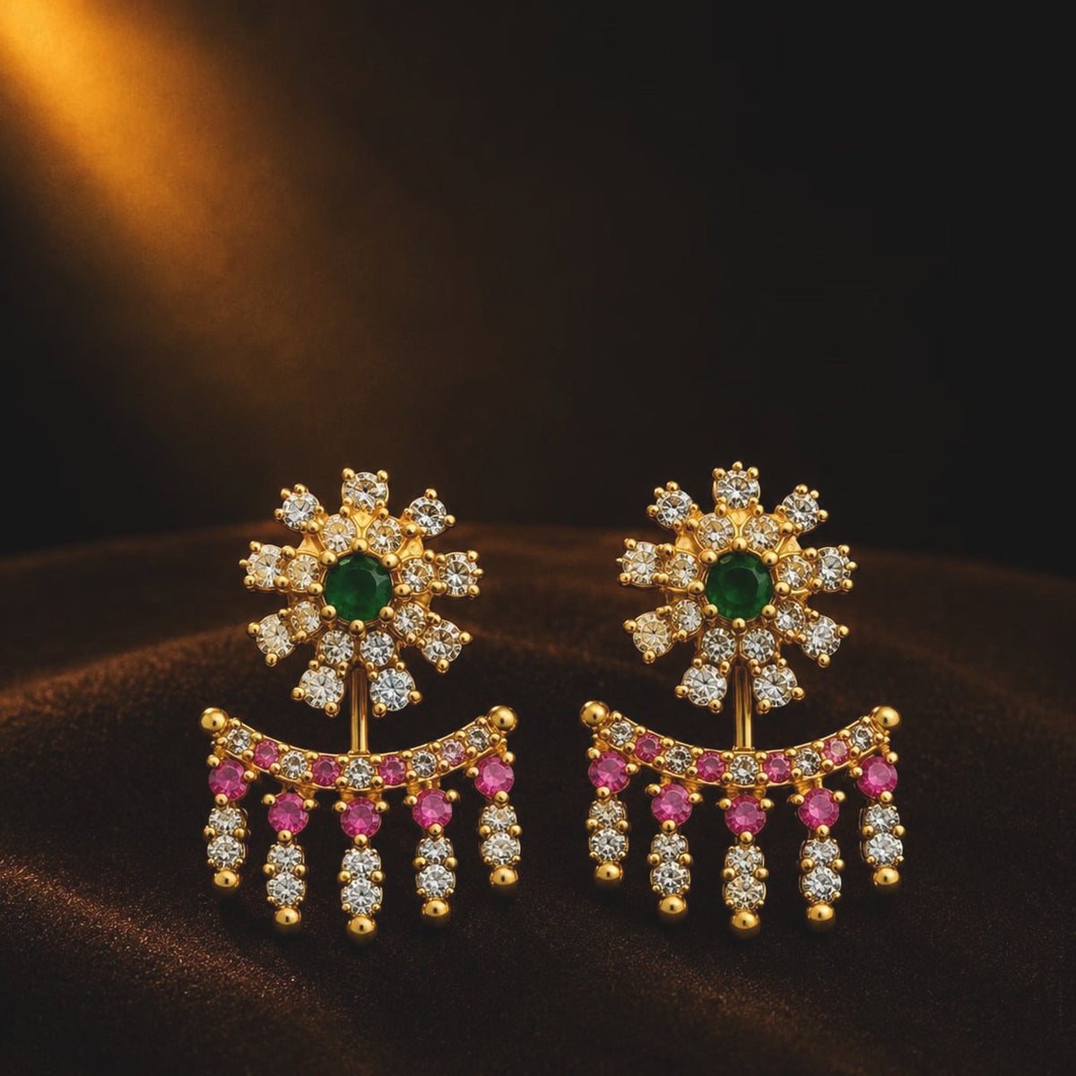 Floral ear jacket earrings with emerald-toned studs and ruby-toned lower jacket