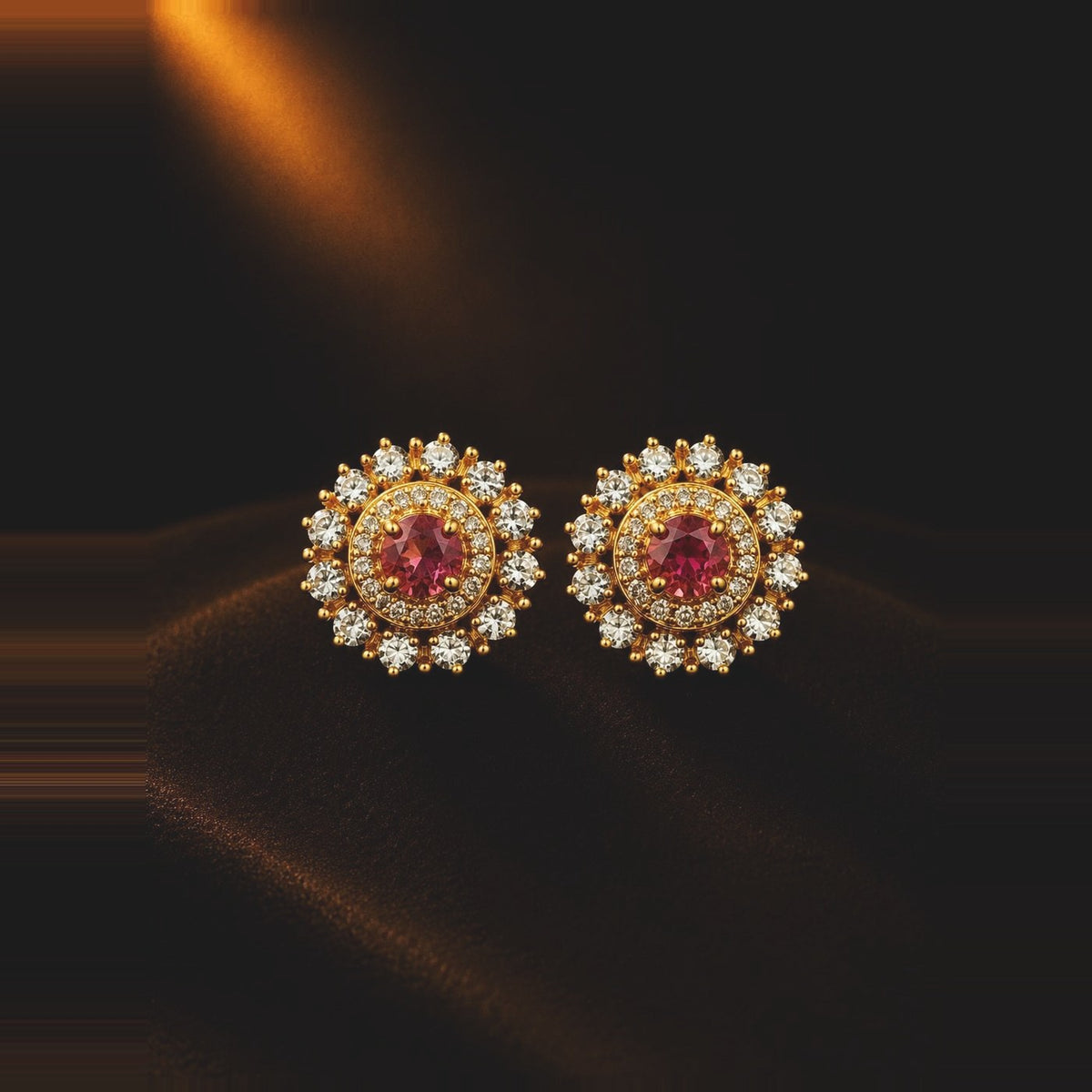 Ruby-toned halo stud earrings with clear stone surround
